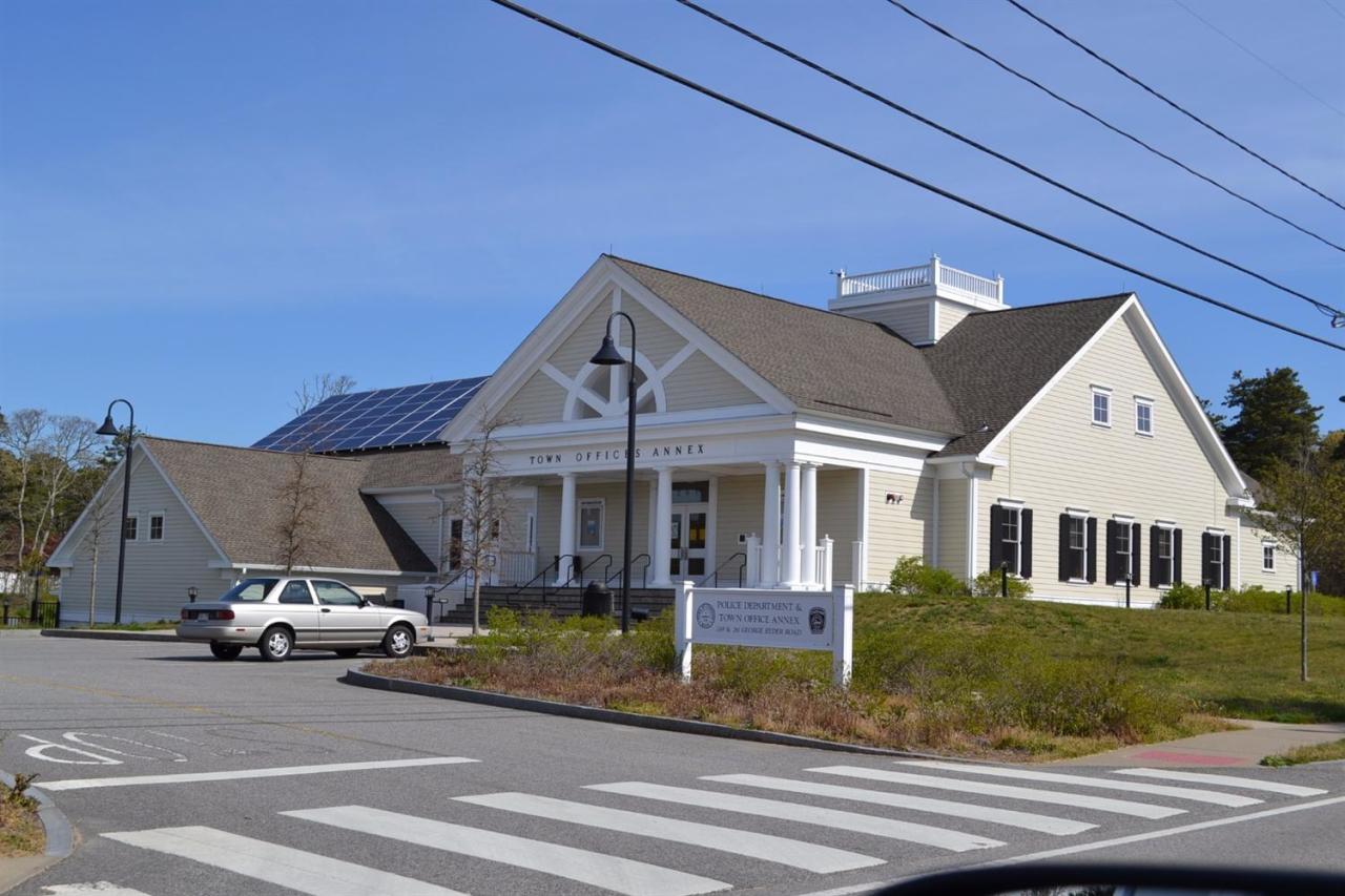 181 George Ryder Road Chatham, MA 02633 - Photo 24 of 24 a view of a house with car parked beside it
