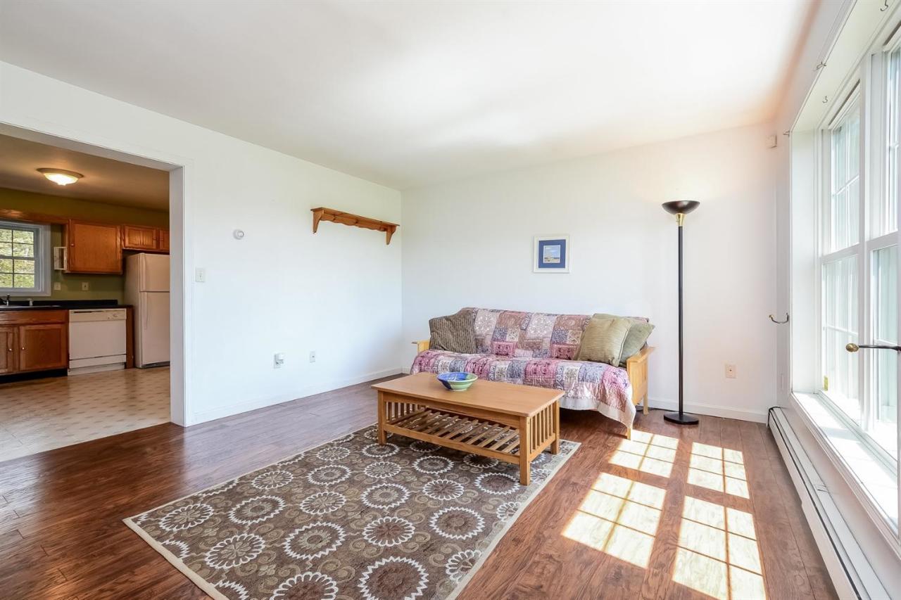 181 George Ryder Road Chatham, MA 02633 - Photo 3 of 24 a bedroom with furniture and a rug