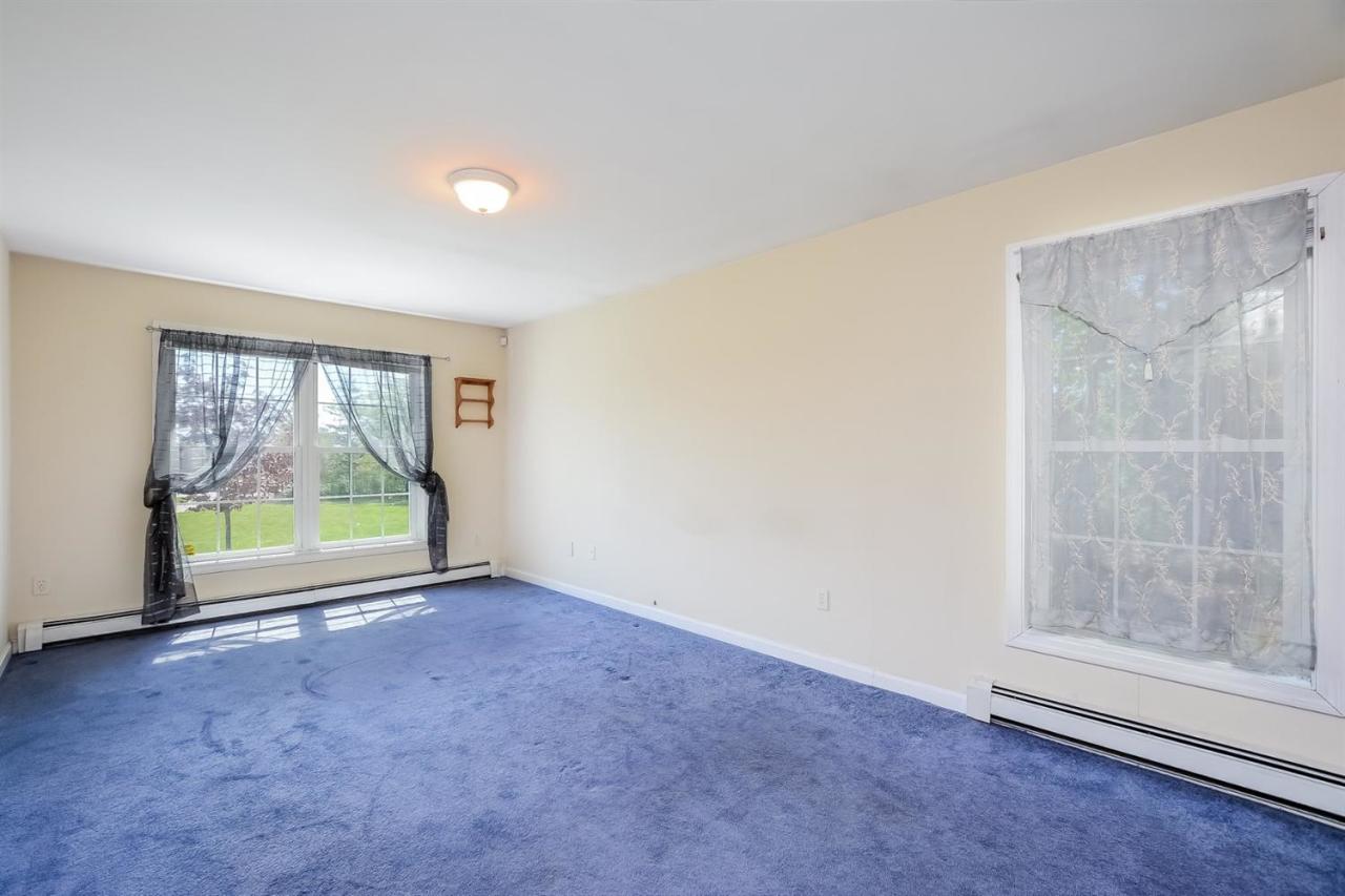 181 George Ryder Road Chatham, MA 02633 - Photo 8 of 24 a view of an empty room with a window