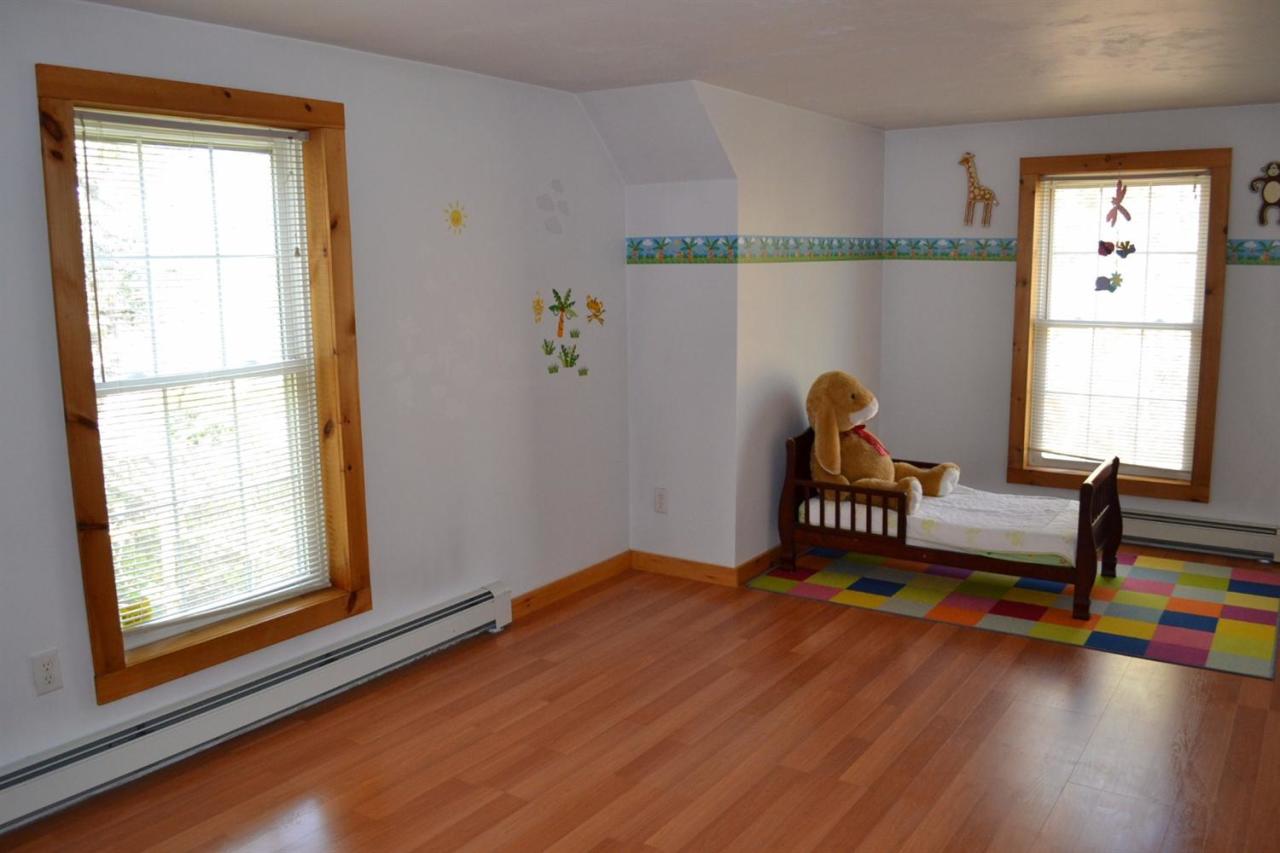 181 George Ryder Road Chatham, MA 02633 - Photo 10 of 24 a bedroom with furniture and a window