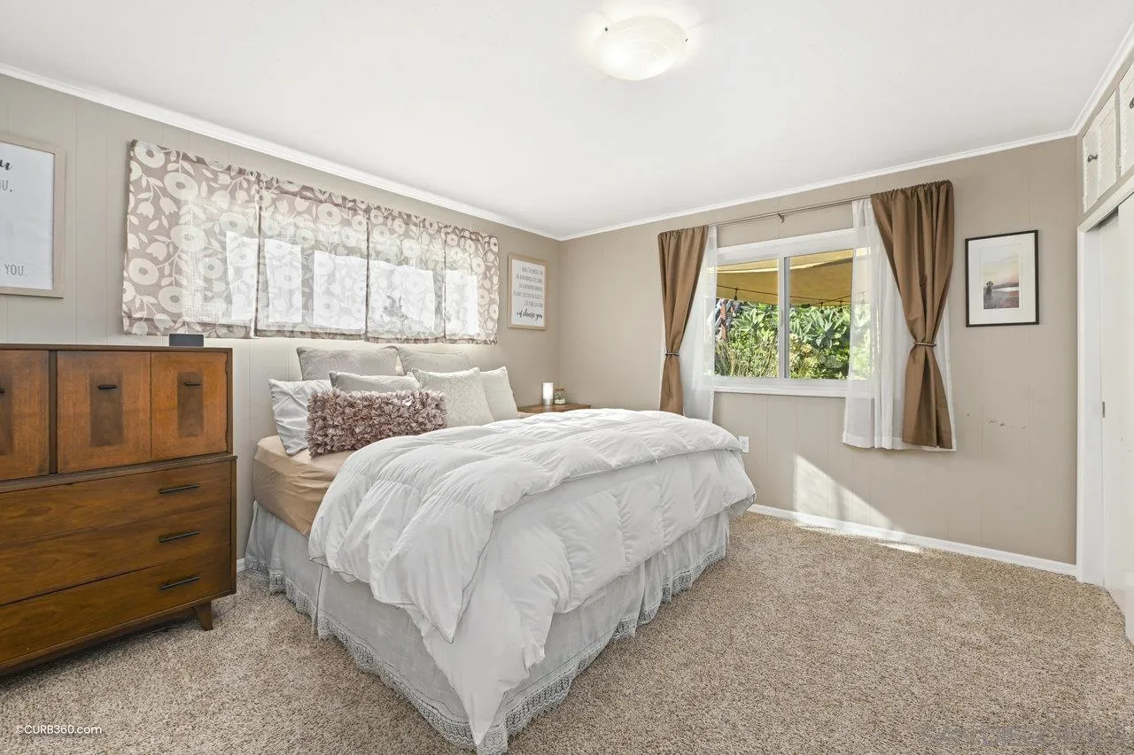 3726 Nassau Drive San Diego, CA 92115 - Photo 12 of 37 a bedroom with a bed and a window