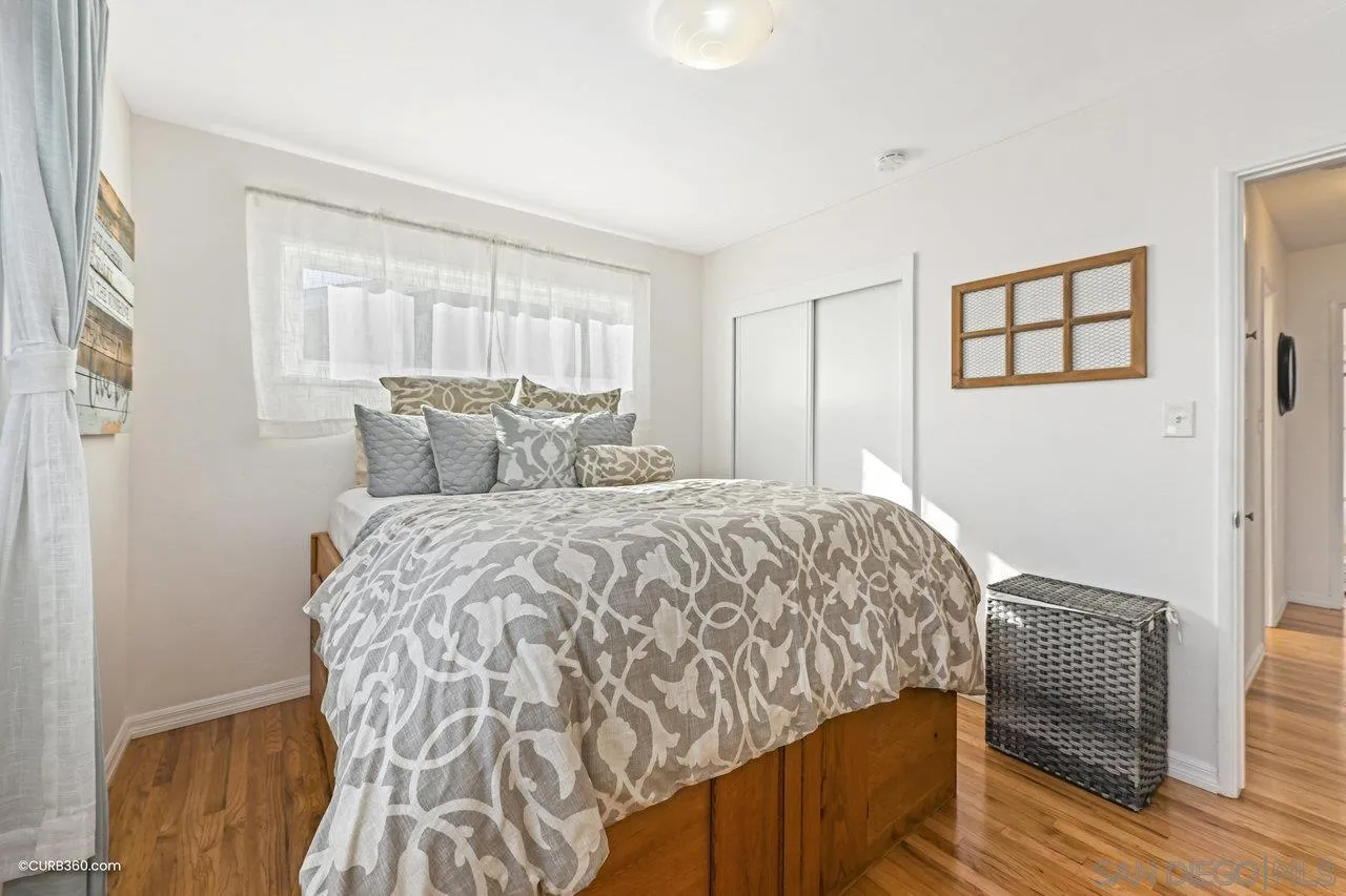 3726 Nassau Drive San Diego, CA 92115 - Photo 15 of 37 a bedroom with a bed and a window