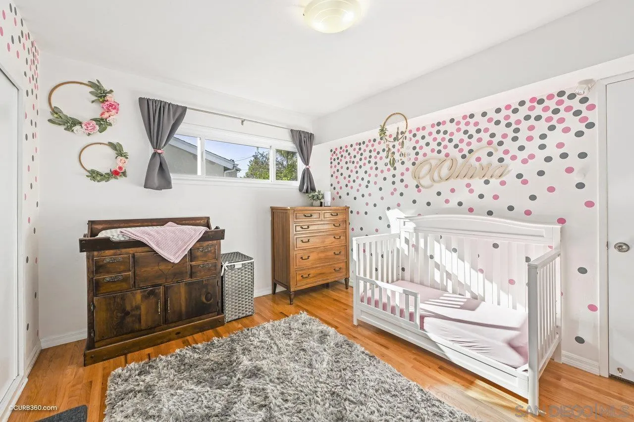 3726 Nassau Drive San Diego, CA 92115 - Photo 17 of 37 a living room with a couch and a table