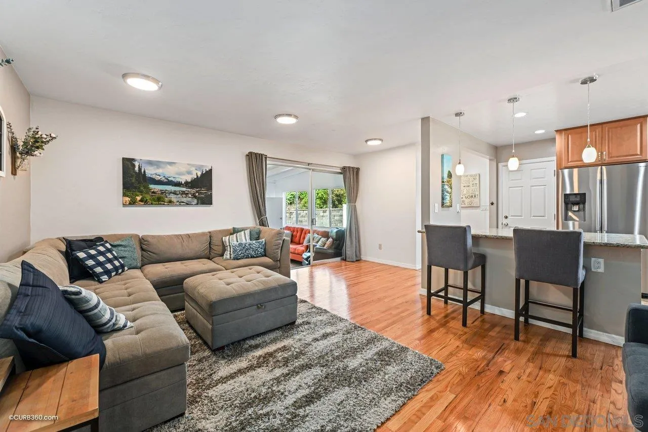 3726 Nassau Drive San Diego, CA 92115 - Photo 2 of 37 a living room with furniture wooden floor and a table
