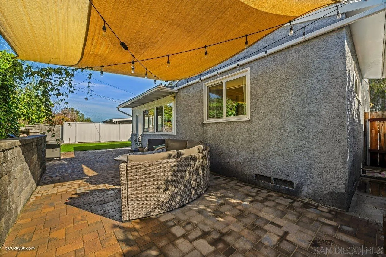 3726 Nassau Drive San Diego, CA 92115 - Photo 29 of 37 a view of a house with a backyard