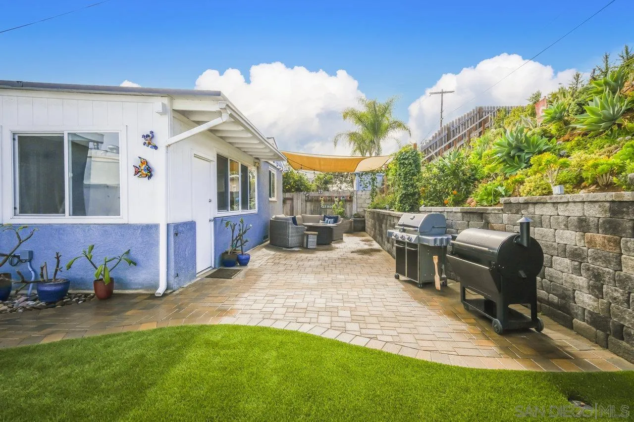3726 Nassau Drive San Diego, CA 92115 - Photo 34 of 37 a view of a house with backyard and sitting area
