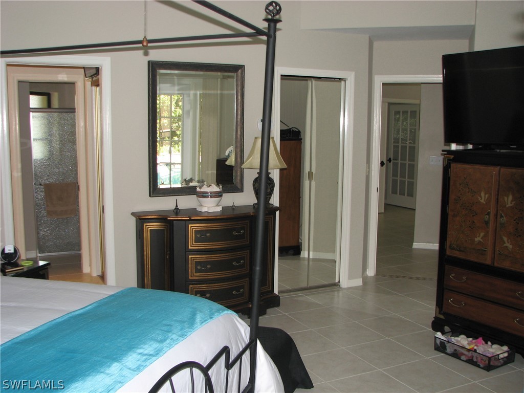 15252 Briar Ridge Circle Fort Myers, FL 33912 - Photo 12 of 25 a view of kitchen with cabinets and wooden floor
