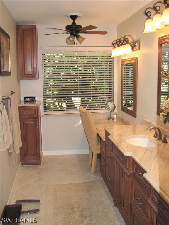 15252 Briar Ridge Circle Fort Myers, FL 33912 - Photo 14 of 25 a bathroom with a tub sink and mirror