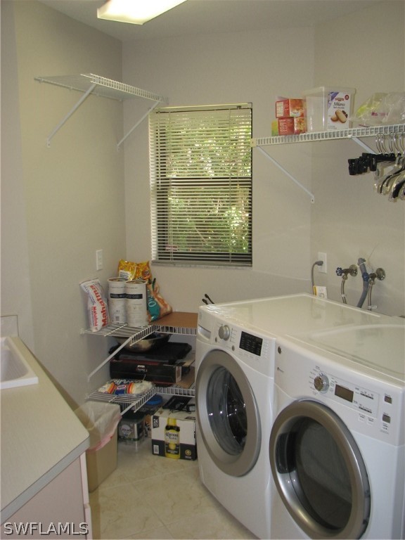 15252 Briar Ridge Circle Fort Myers, FL 33912 - Photo 17 of 25 a utility room with dryer and washer