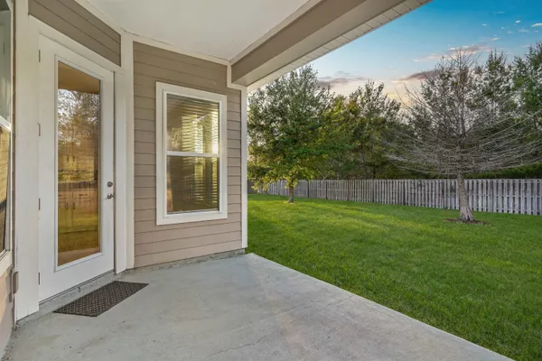 a view of a house with a big yard