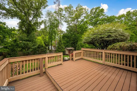 a view of balcony with deck and wooden floor