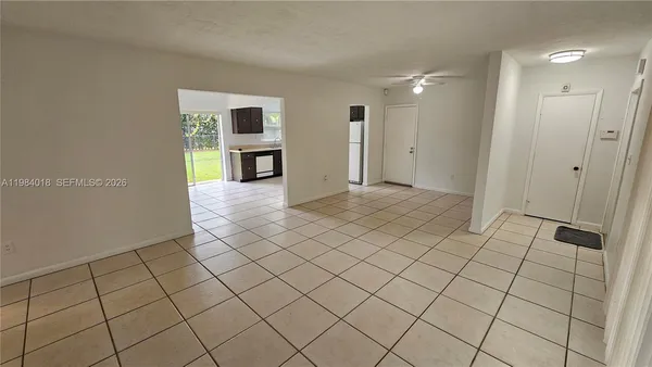 a view of an empty room and window