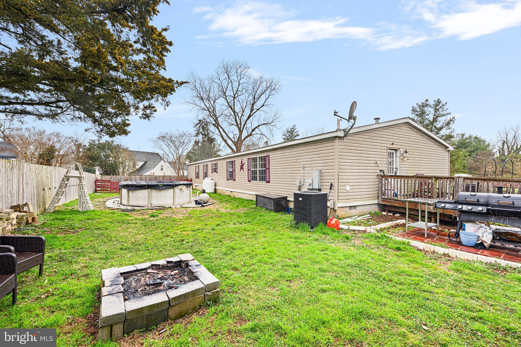 1650 Cypress Branch Road Magnolia, DE 19962 - Photo 34 of 35 Spacious backyard with fire pit and deck.