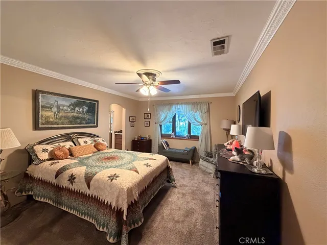 a view of a bathroom from a hallway