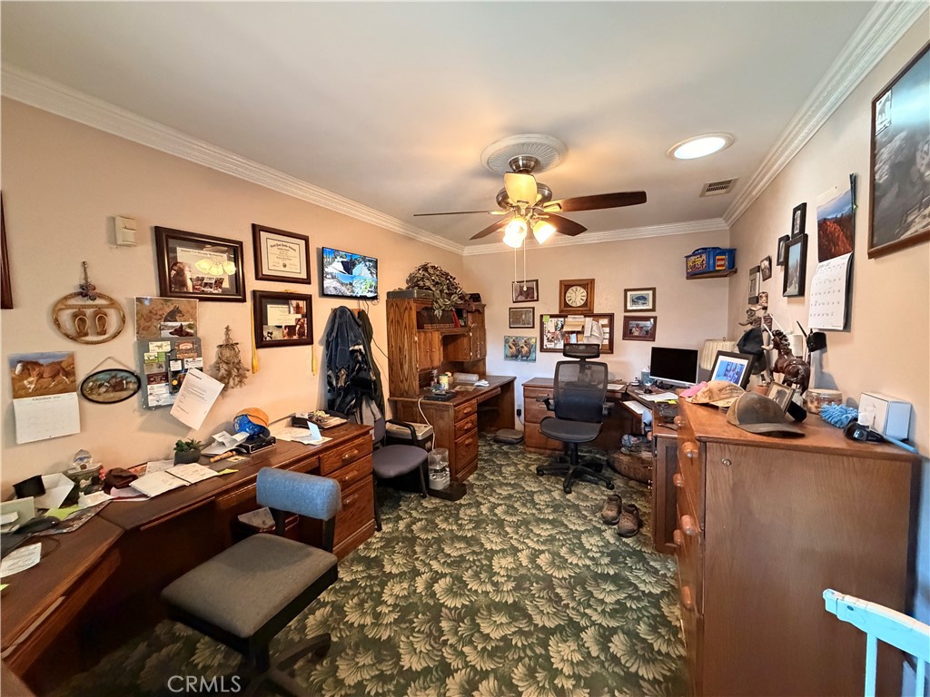 32360 Navajo Road Wildomar, CA 92595 - Photo 14 of 58 a living room with lots of furniture and a view of kitchen
