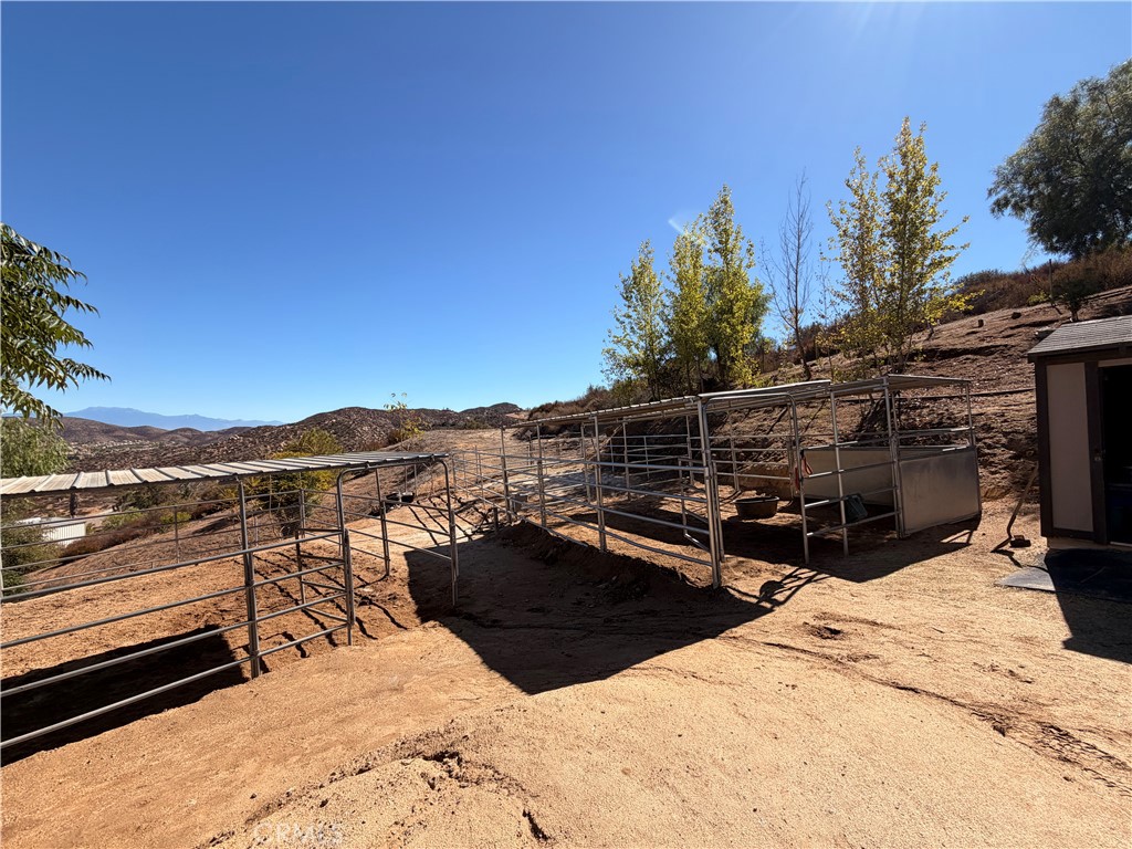 32360 Navajo Road Wildomar, CA 92595 - Photo 43 of 58 a view of a terrace with chairs