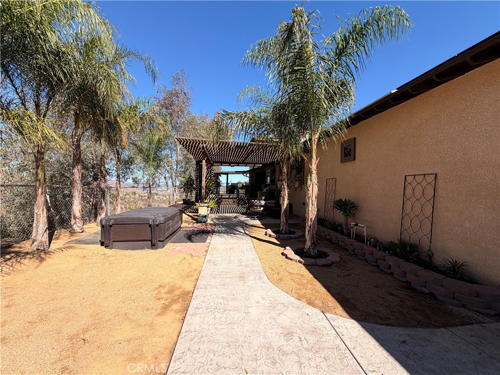 32360 Navajo Road Wildomar, CA 92595 - Photo 47 of 58 a view of swimming pool with a patio