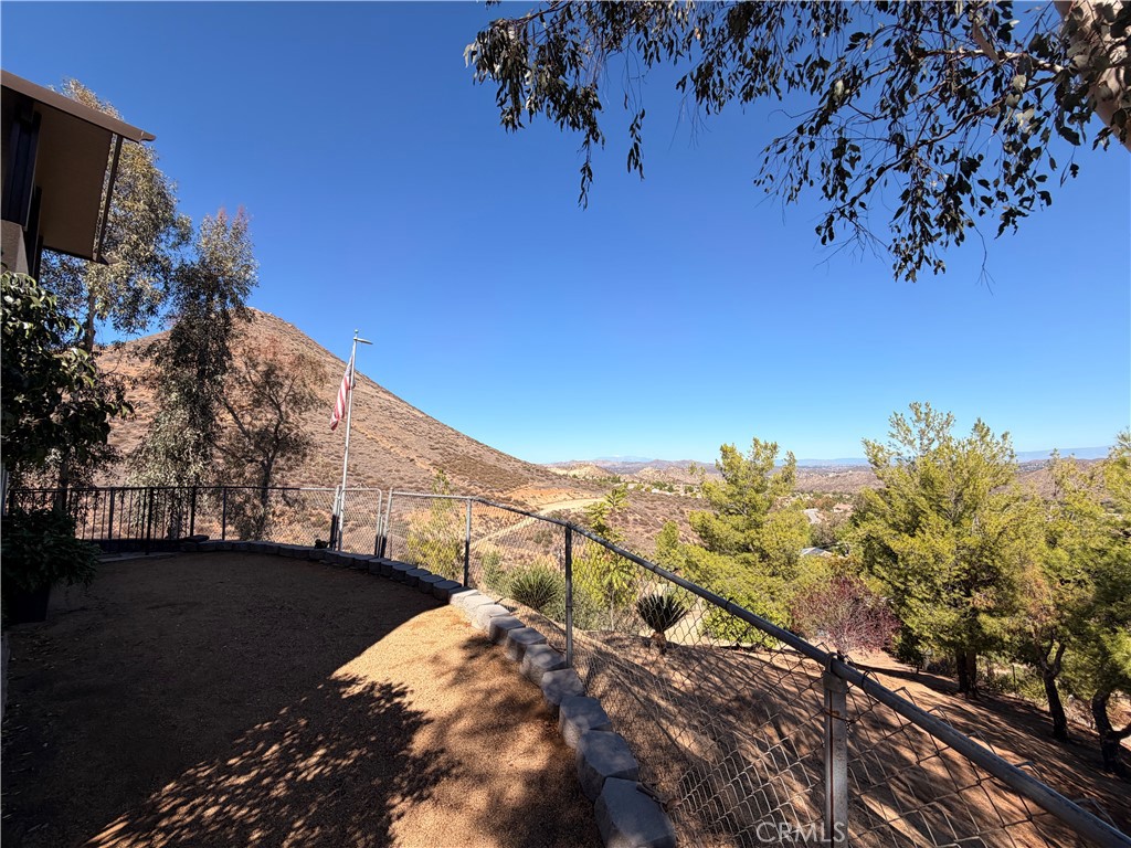 32360 Navajo Road Wildomar, CA 92595 - Photo 52 of 58 a view of a house with a mountain