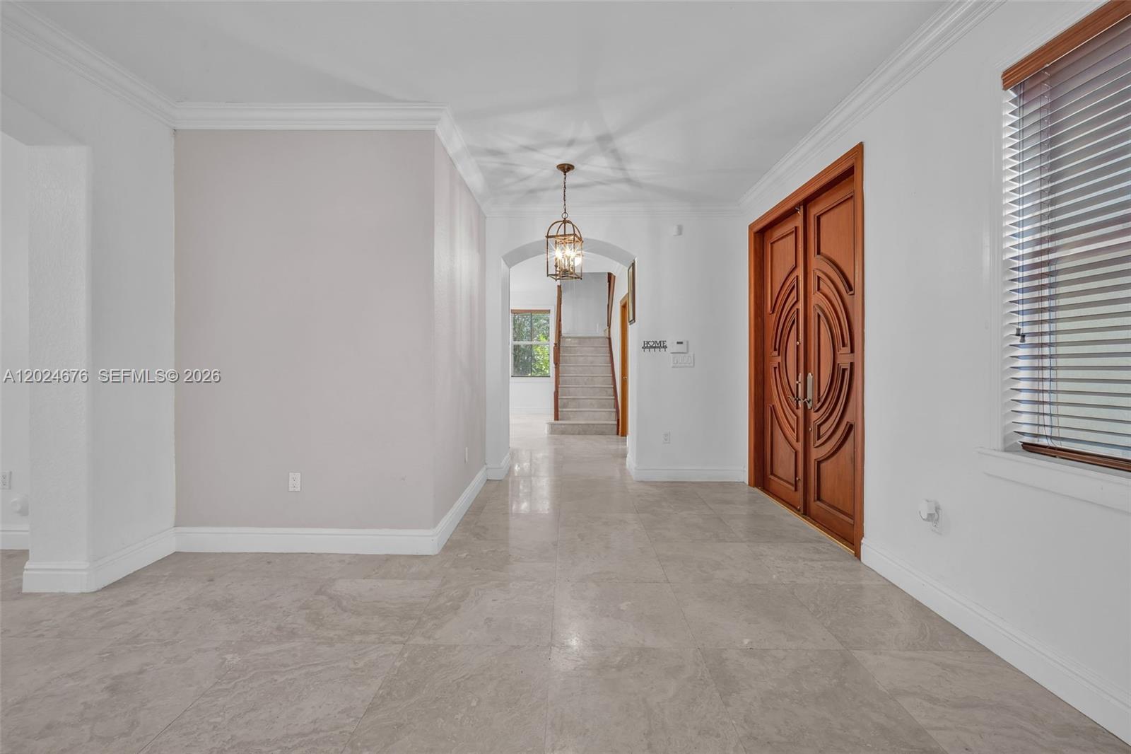 2155 Southwest 156th Court Miami, FL 33185 - Photo 16 of 57 an empty room with windows and cabinet
