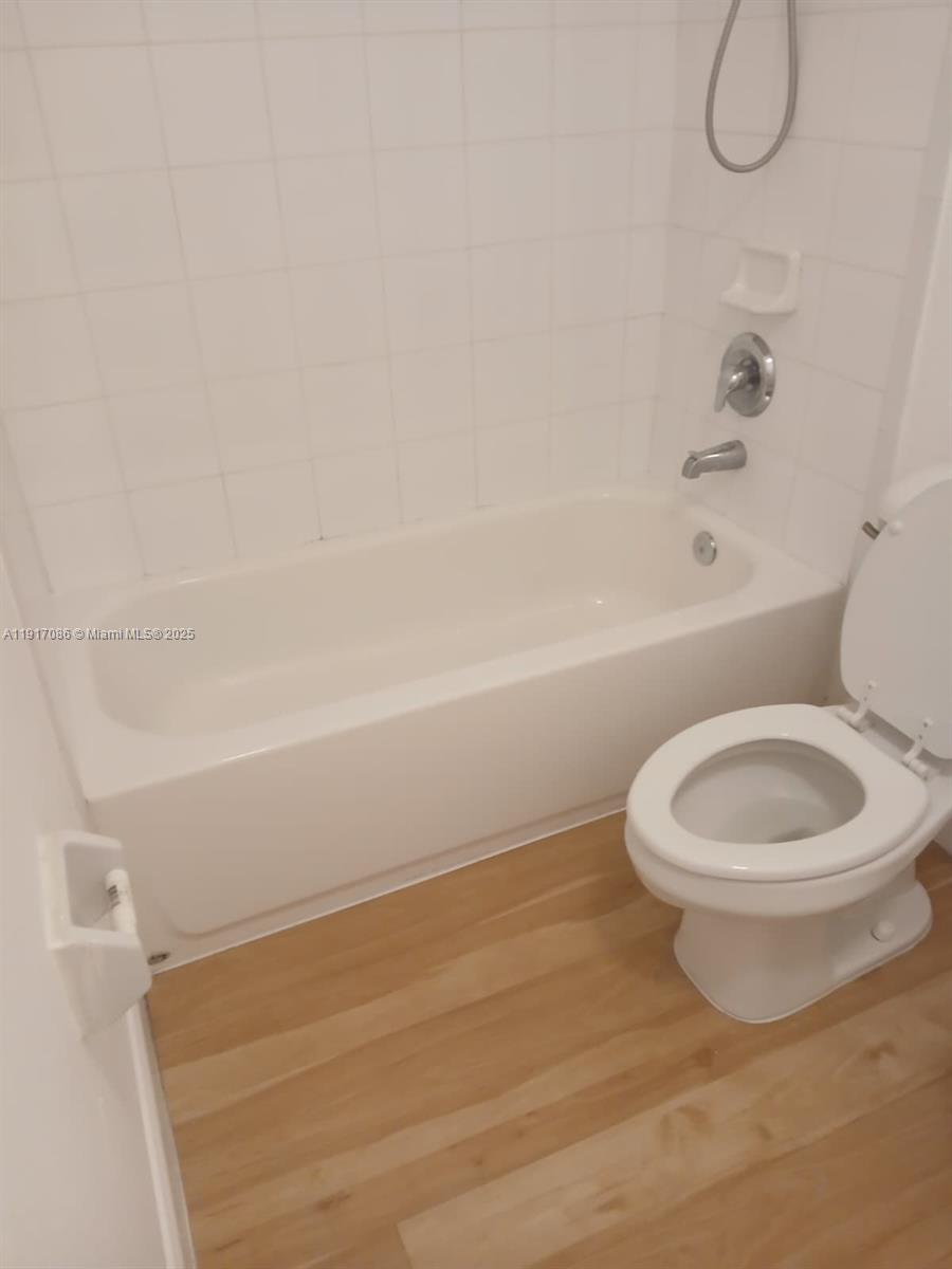 24386 Southwest 109th Court, Unit / Homestead, FL 33032 - Photo 23 of 33 a bathroom with a toilet and a shower