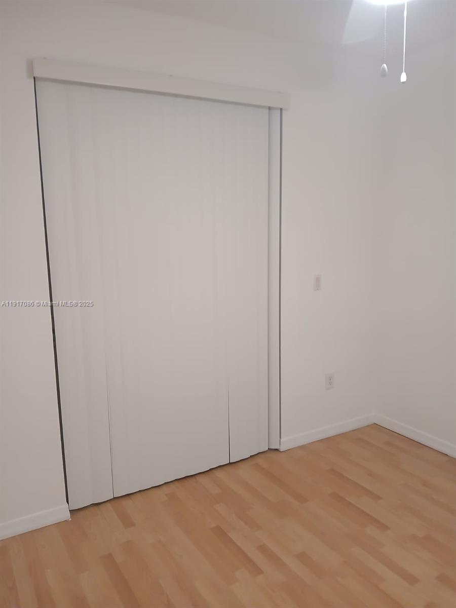 24386 Southwest 109th Court, Unit / Homestead, FL 33032 - Photo 29 of 33 a view of empty room