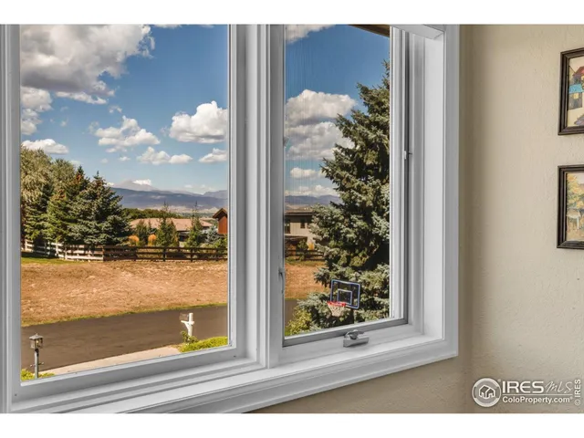 a spacious bathroom with a sink a mirror and a bathtub