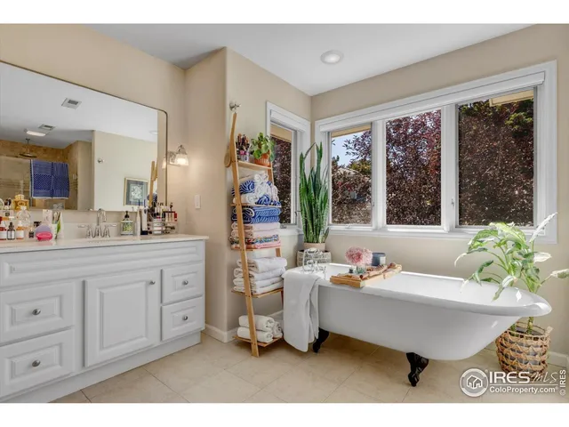 a room with lots of white walls and shoes