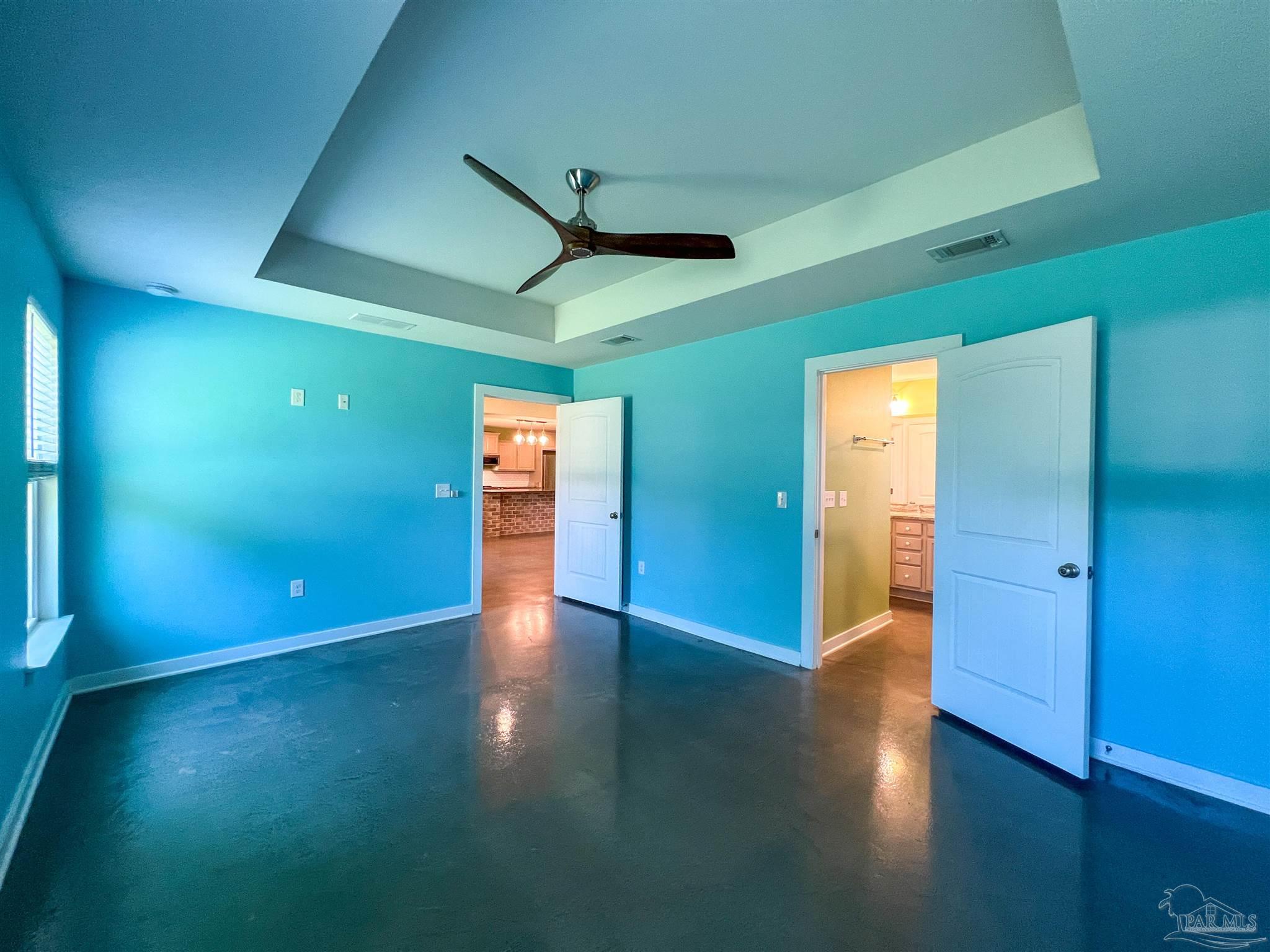 4906 Landmark Lane Pace, FL 32571 - Photo 14 of 34 an empty room with wooden floor and closet