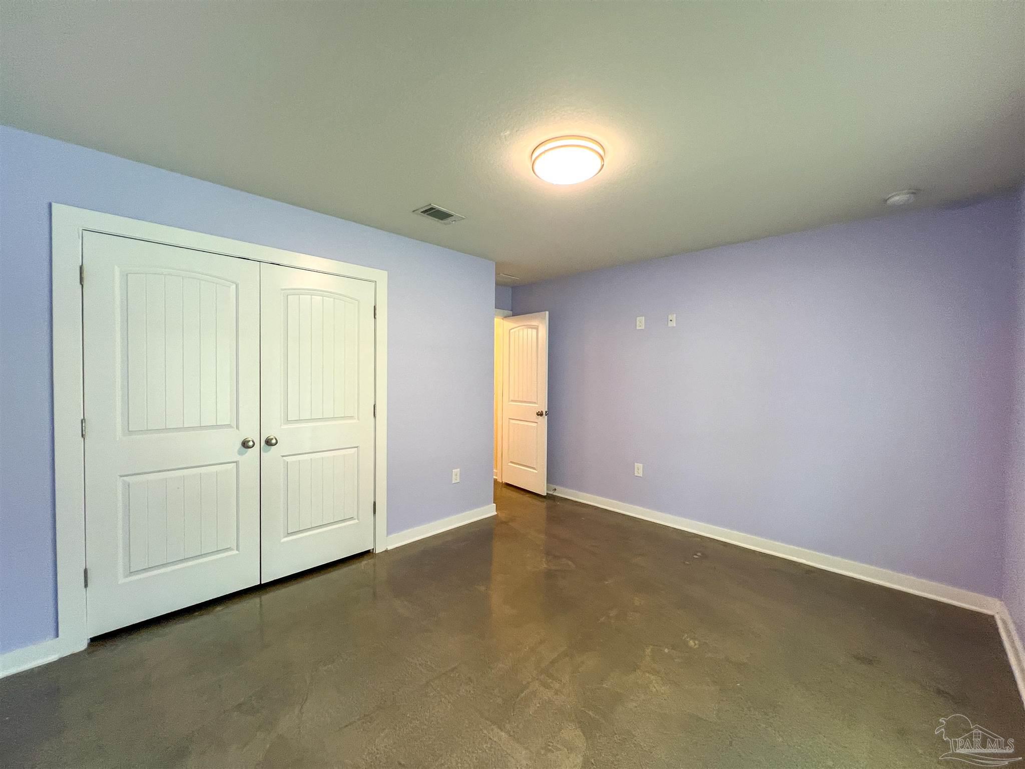 4906 Landmark Lane Pace, FL 32571 - Photo 21 of 34 an empty room with window
