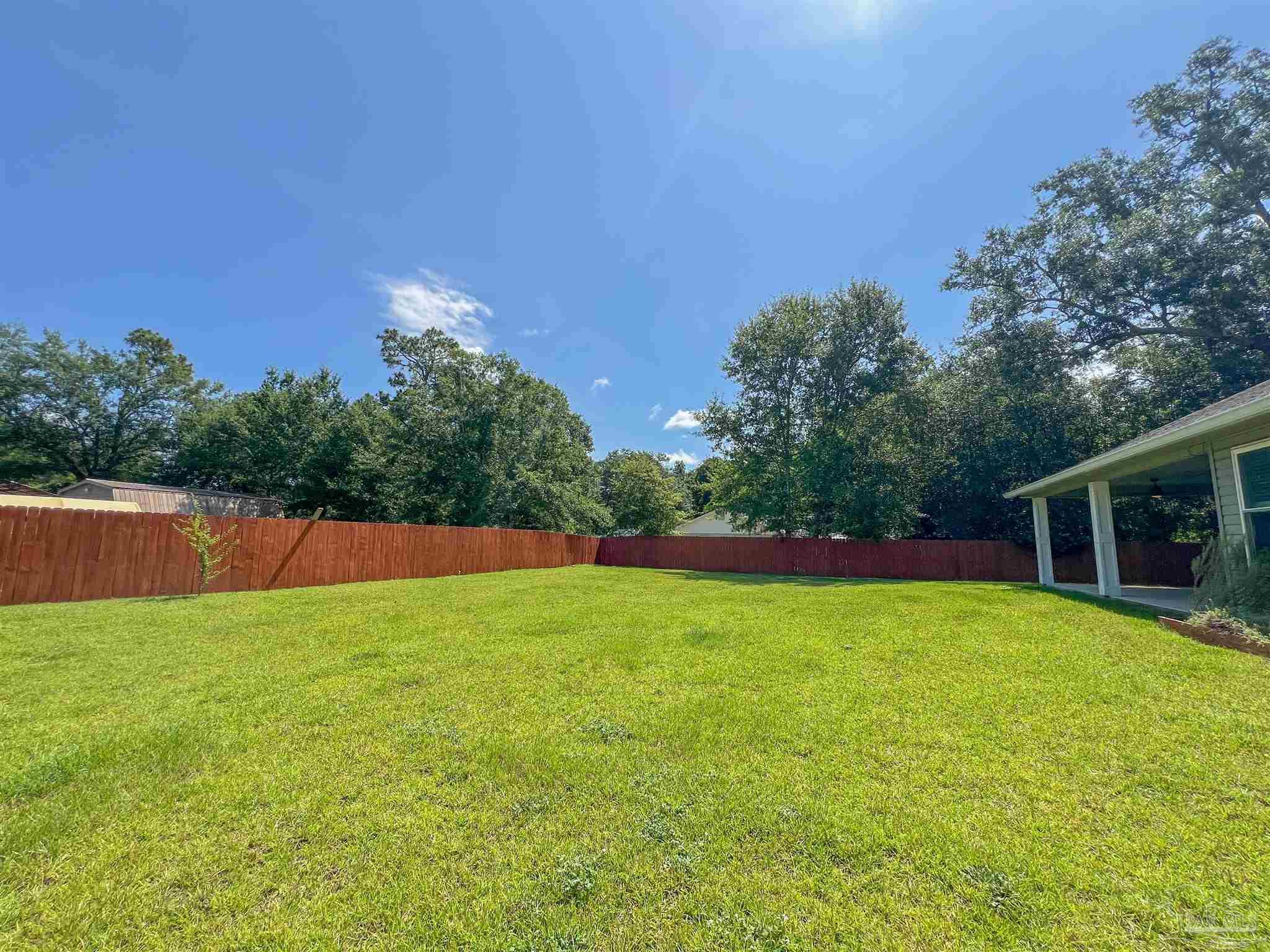 4906 Landmark Lane Pace, FL 32571 - Photo 34 of 34 a view of a backyard