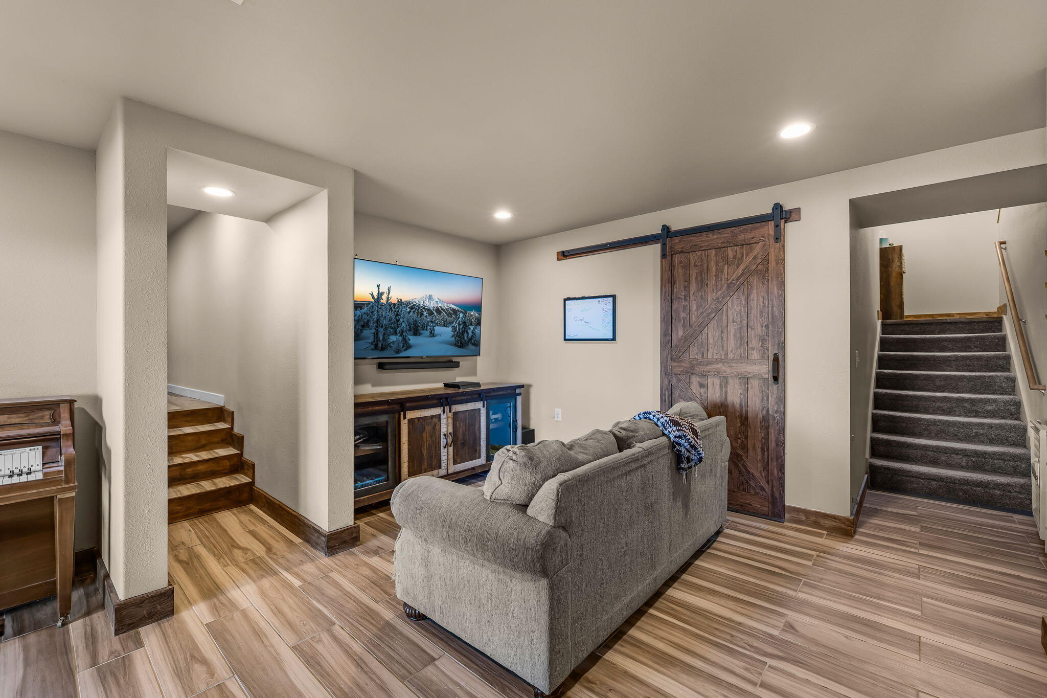 6040 Gravett Road Prineville, OR 97754 - Photo 28 of 77 a living room with furniture and a fireplace