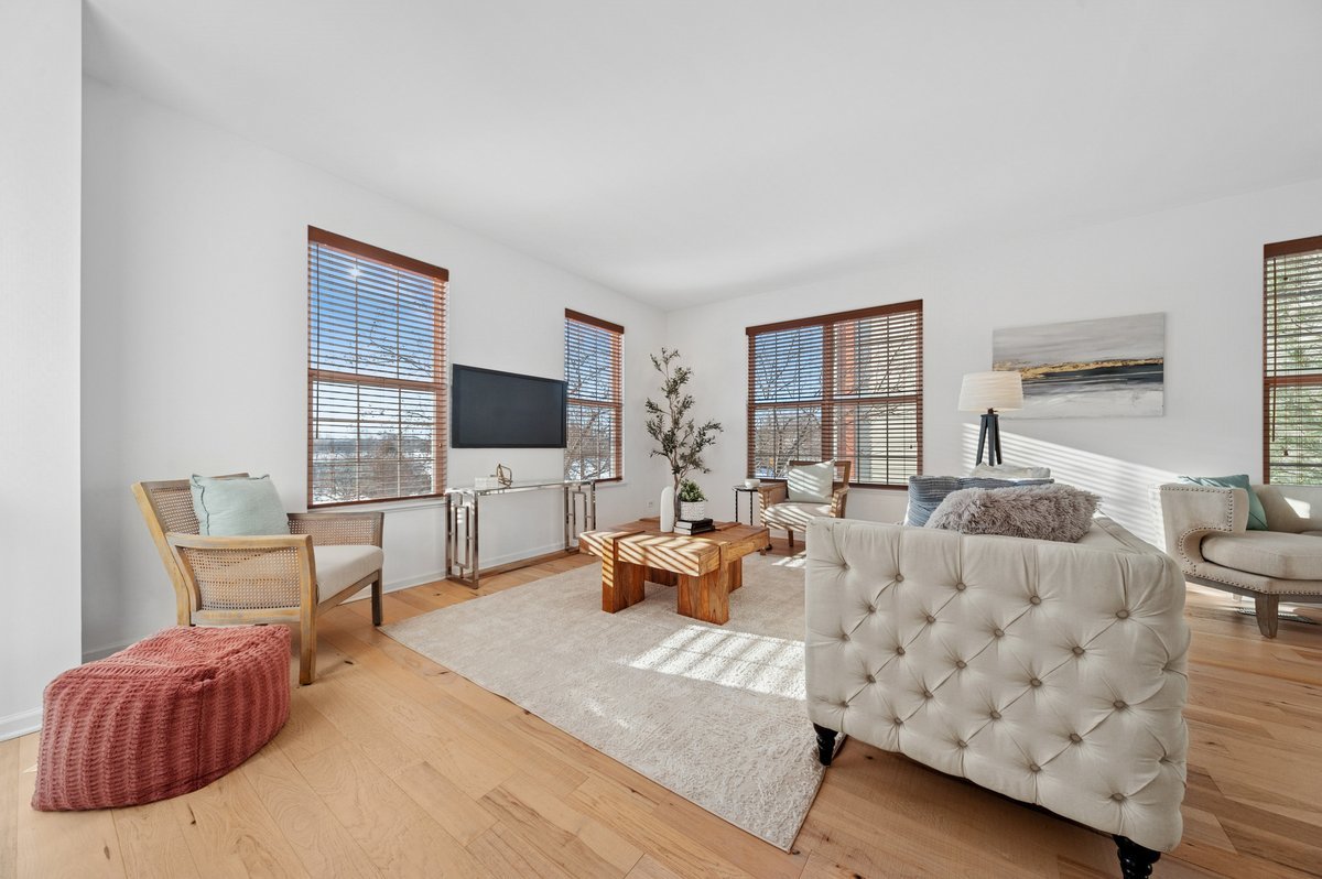 152 Jackson Street Gilberts, IL 60136 - Photo 2 of 32 a living room with furniture and a flat screen tv