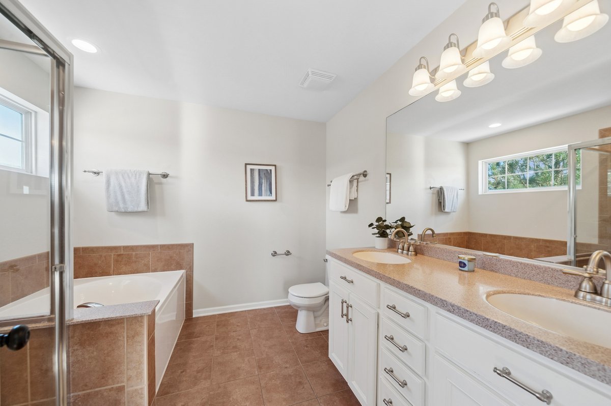 152 Jackson Street Gilberts, IL 60136 - Photo 21 of 32 a bathroom with a double vanity sink mirror and toilet