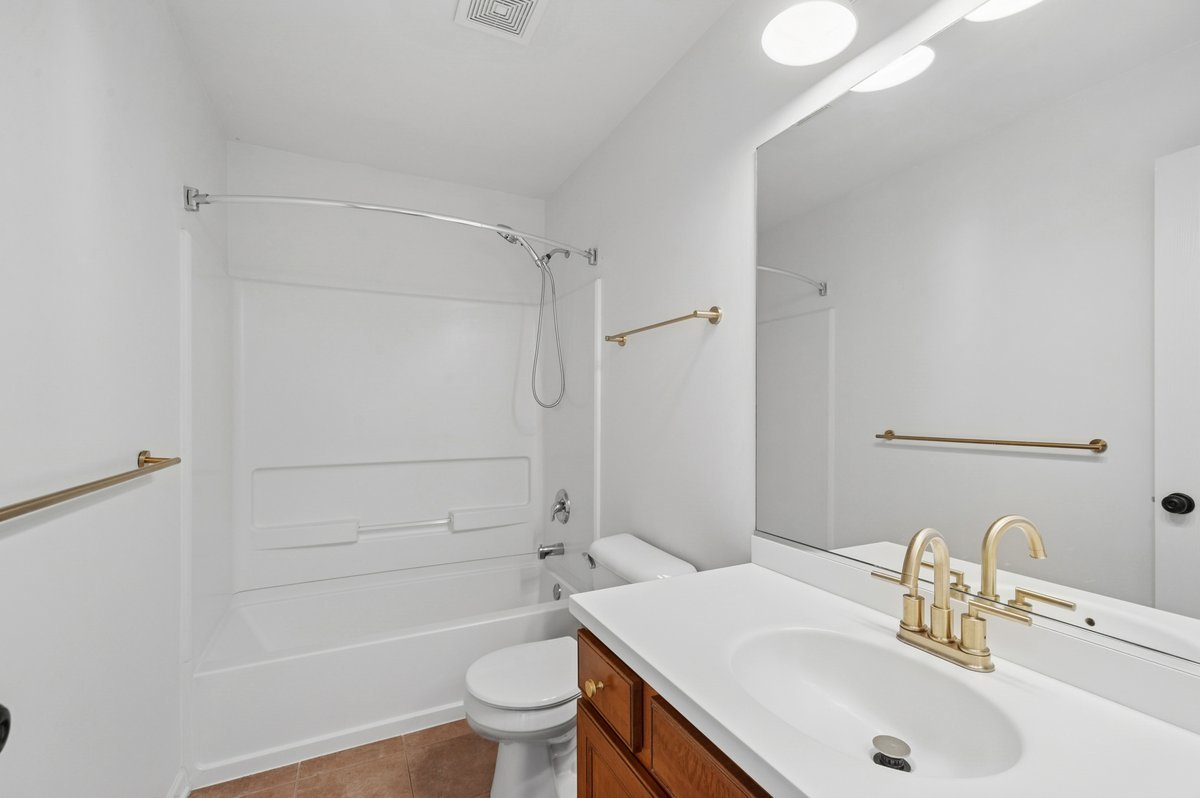 152 Jackson Street Gilberts, IL 60136 - Photo 22 of 32 a bathroom with a sink toilet and shower