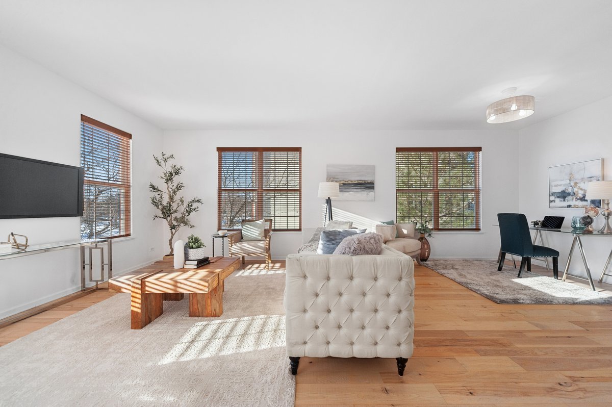 152 Jackson Street Gilberts, IL 60136 - Photo 3 of 32 a living room with furniture and a flat screen tv