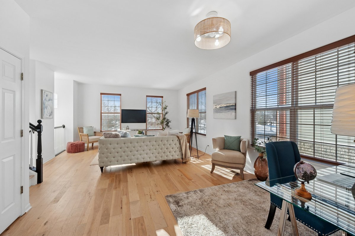 152 Jackson Street Gilberts, IL 60136 - Photo 9 of 32 a living room with furniture and a flat screen tv