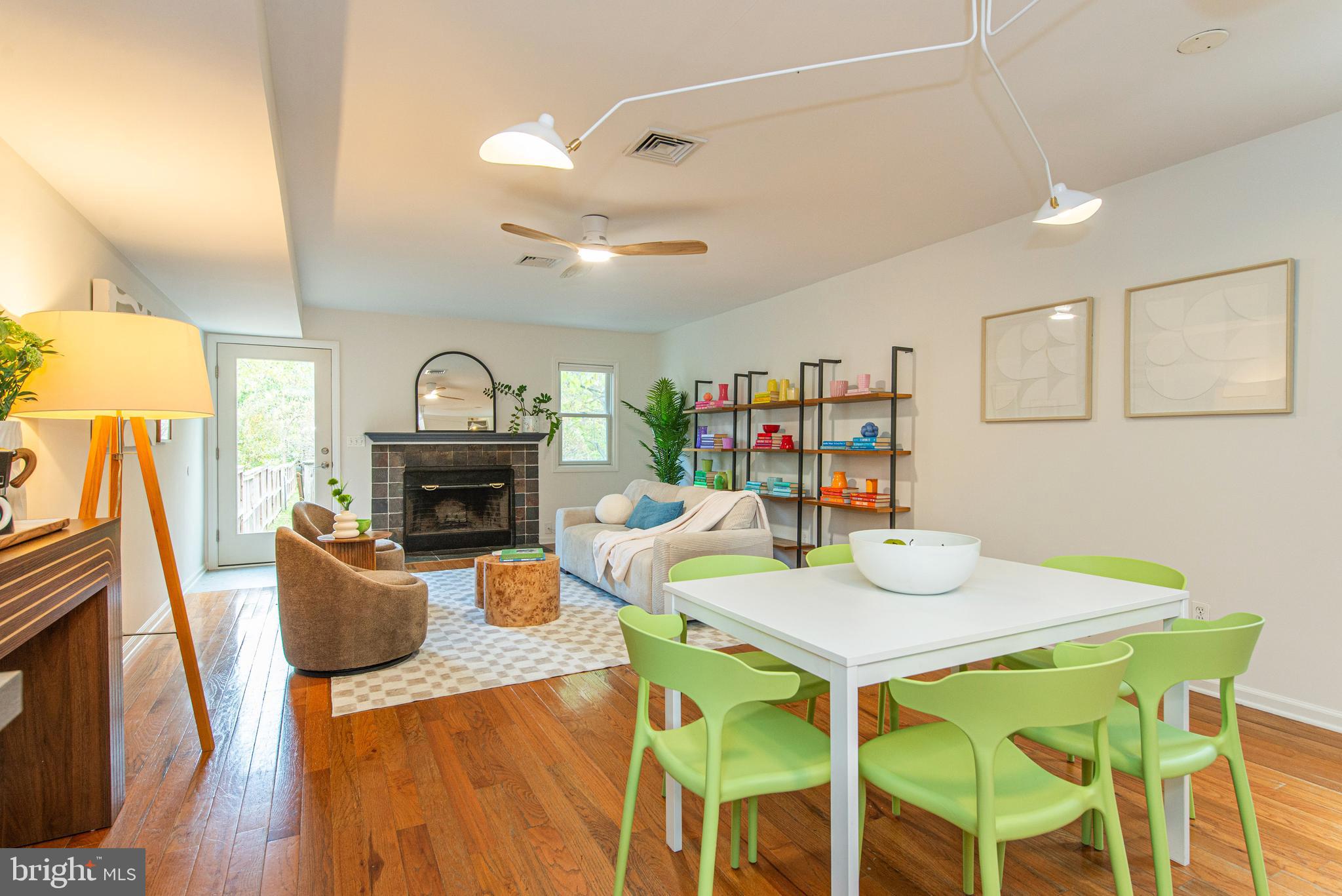 229 South Main Street Pennington, NJ 08534 - Photo 1 of 36 a view of a dining room with furniture a fireplace and wooden floor