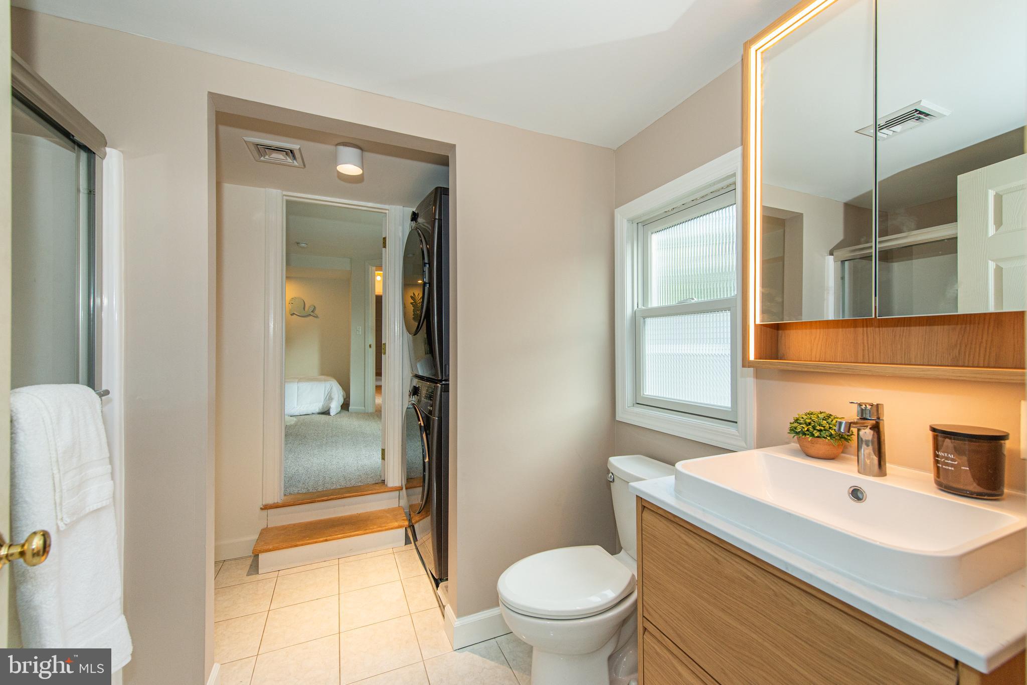 229 South Main Street Pennington, NJ 08534 - Photo 23 of 36 a bathroom with a sink toilet vanity and shower