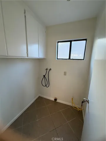 a view of a room with rack on the wall