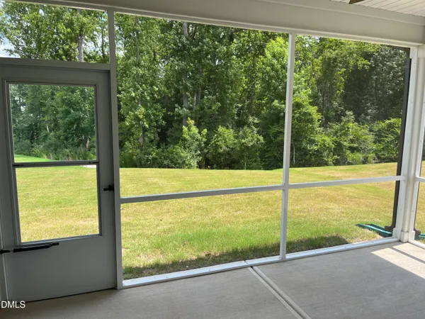 a view of an outdoor space with a large window