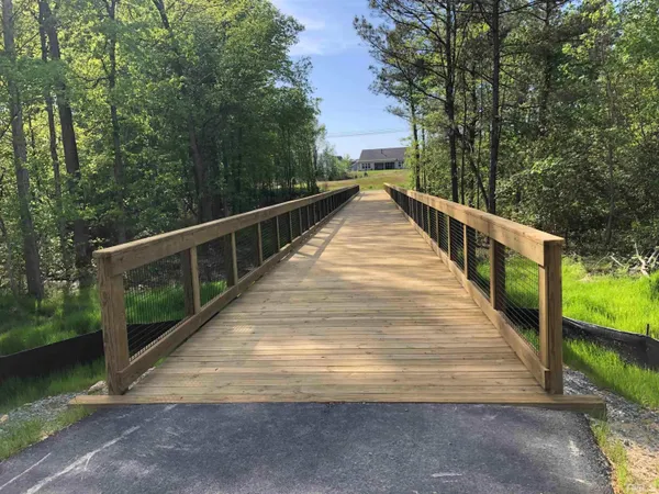 a view of balcony and yard