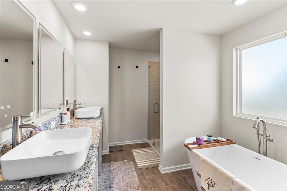 104 Red Barn Court Perry, GA 31069 - Photo 22 of 31 a bathroom with a sink and a mirror