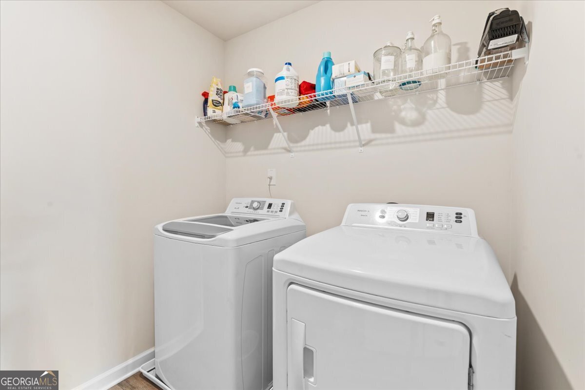 104 Red Barn Court Perry, GA 31069 - Photo 28 of 31 a utility room with dryer and washer