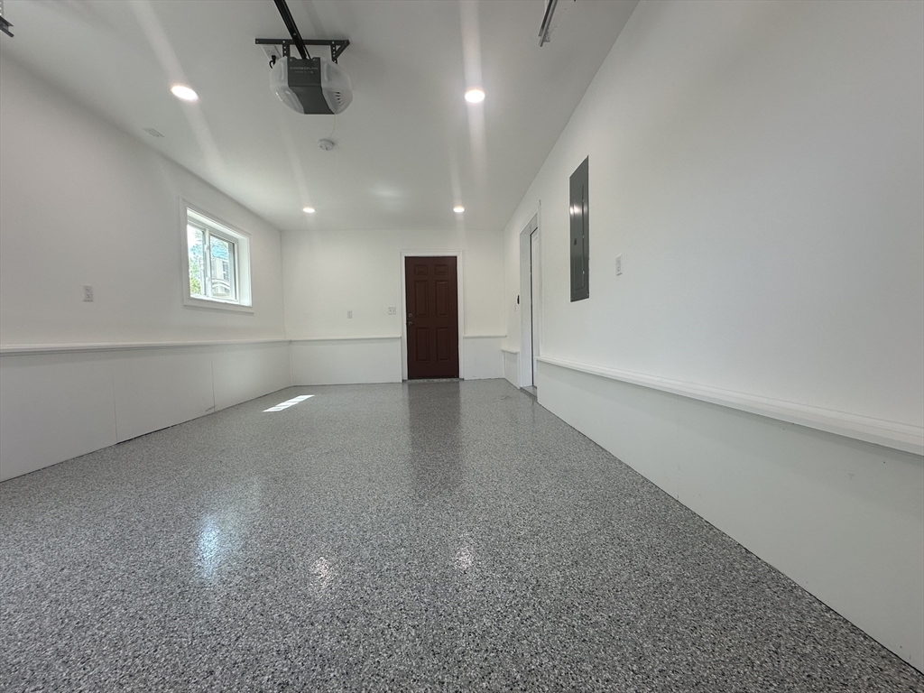 102 Wells Road Becket, MA 01223 - Photo 29 of 40 an empty room with a empty space and windows