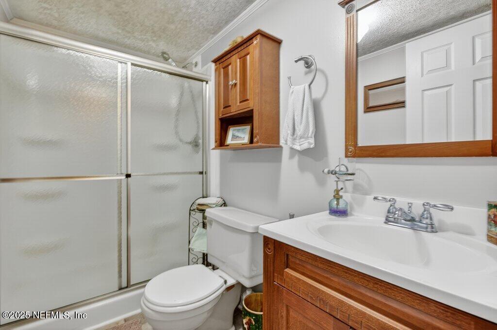 695 Carlin Road Satsuma, FL 32189 - Photo 24 of 53 a bathroom with a sink toilet and shower