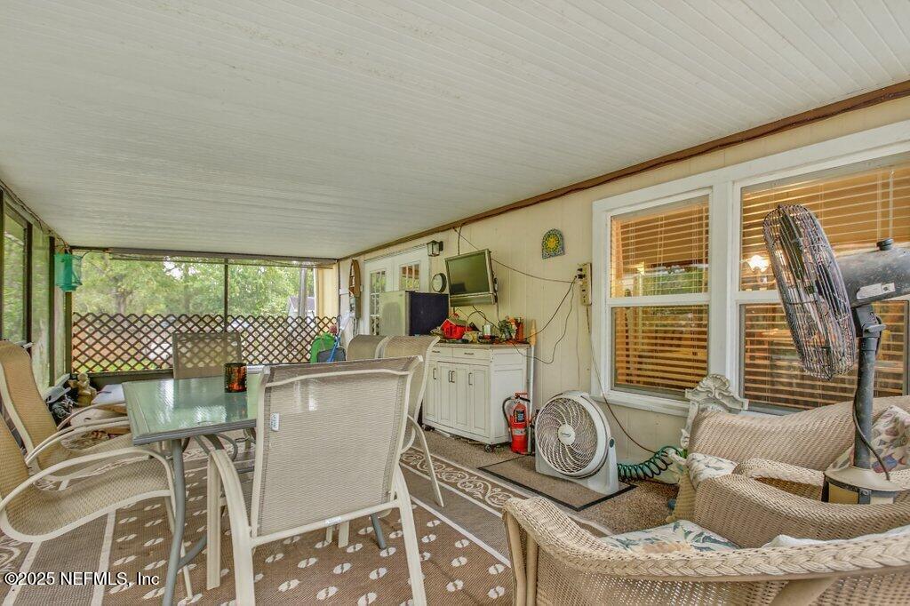 695 Carlin Road Satsuma, FL 32189 - Photo 29 of 53 a dining room with furniture