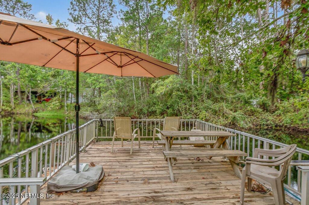 695 Carlin Road Satsuma, FL 32189 - Photo 37 of 53 a balcony with a city view