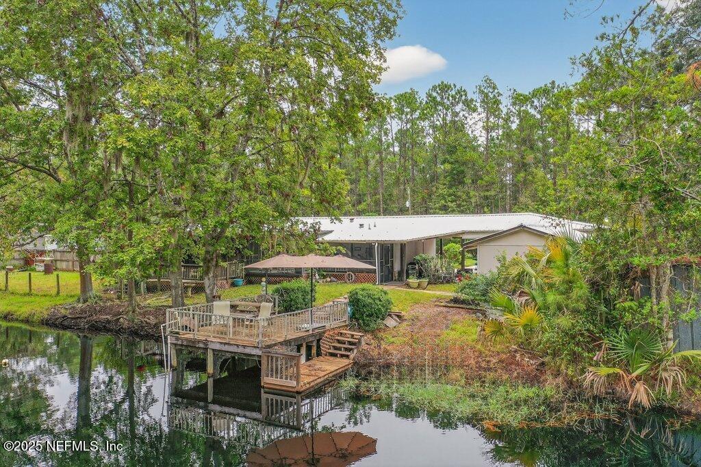 695 Carlin Road Satsuma, FL 32189 - Photo 45 of 53 a view of a house with a yard and sitting area