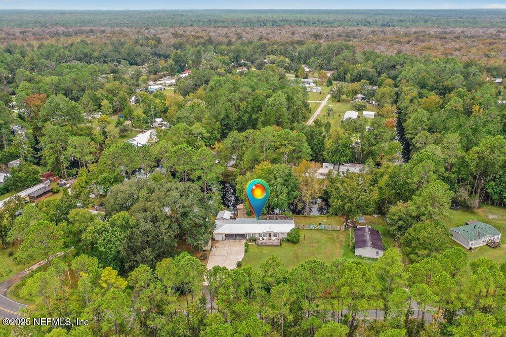 695 Carlin Road Satsuma, FL 32189 - Photo 46 of 53 an aerial view of a house with a yard