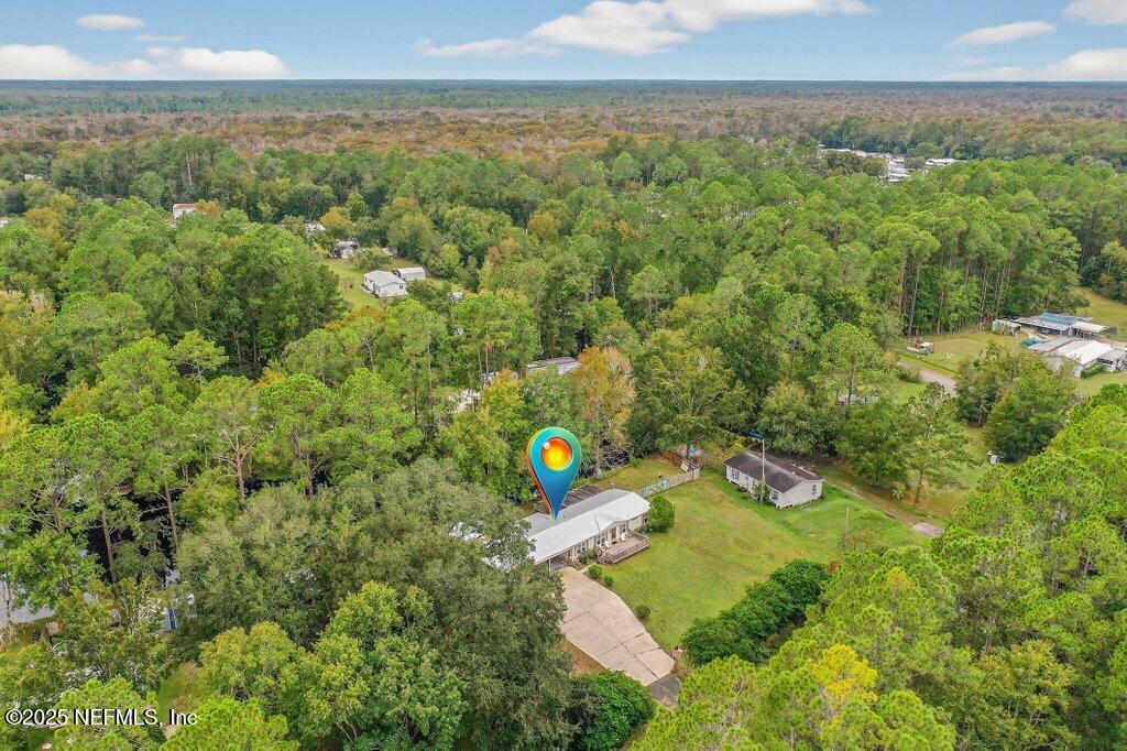 695 Carlin Road Satsuma, FL 32189 - Photo 49 of 53 an aerial view of a house with a yard
